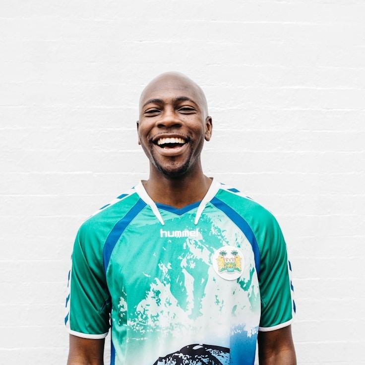 Kaveri Mehta, Lead Design Curator at PeakForgeMirror, reviewing corporate floral arrangements